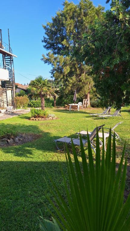 Garden and outdoor seating at Antzela Apartments